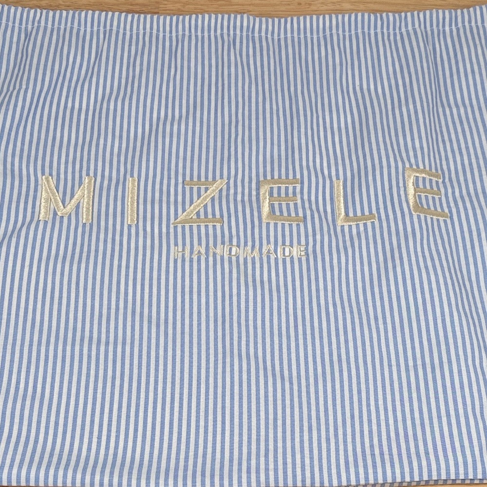NWOT Mizele luxury handbags striped dust cover